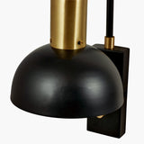 Mayfair Matt Black Domed Task Wall Light with brass stem and mounting bracket, close-up on a plain white background.