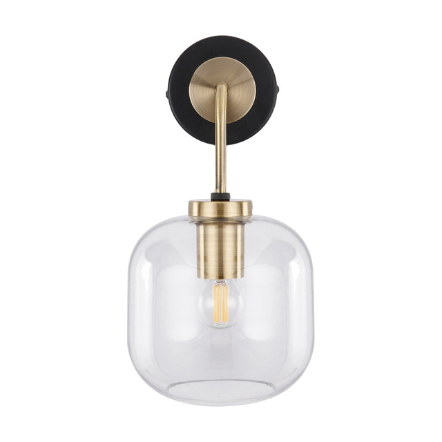 Florence Black Iron & Glass Wall Light, 32cm, with a round black backplate, curved brass arm and clear glass globe shade housing a visible bulb, shown on a plain white background.