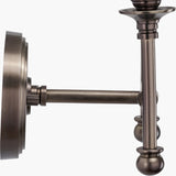 Close-up of the Piero Antique Bronze Double Wall Light showing the wall backplate, arm, and turned metal column detail against a plain white background.