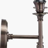 Close-up of the Piero Antique Bronze Double Wall Light showing the metal wall backplate, adjustable arm, and candle-style holders against a plain white background.