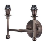 Piero Antique Bronze Double Wall Light, 21cm, with two curved arms holding lamp holders on round wall mount, traditional metal design, plain white background.