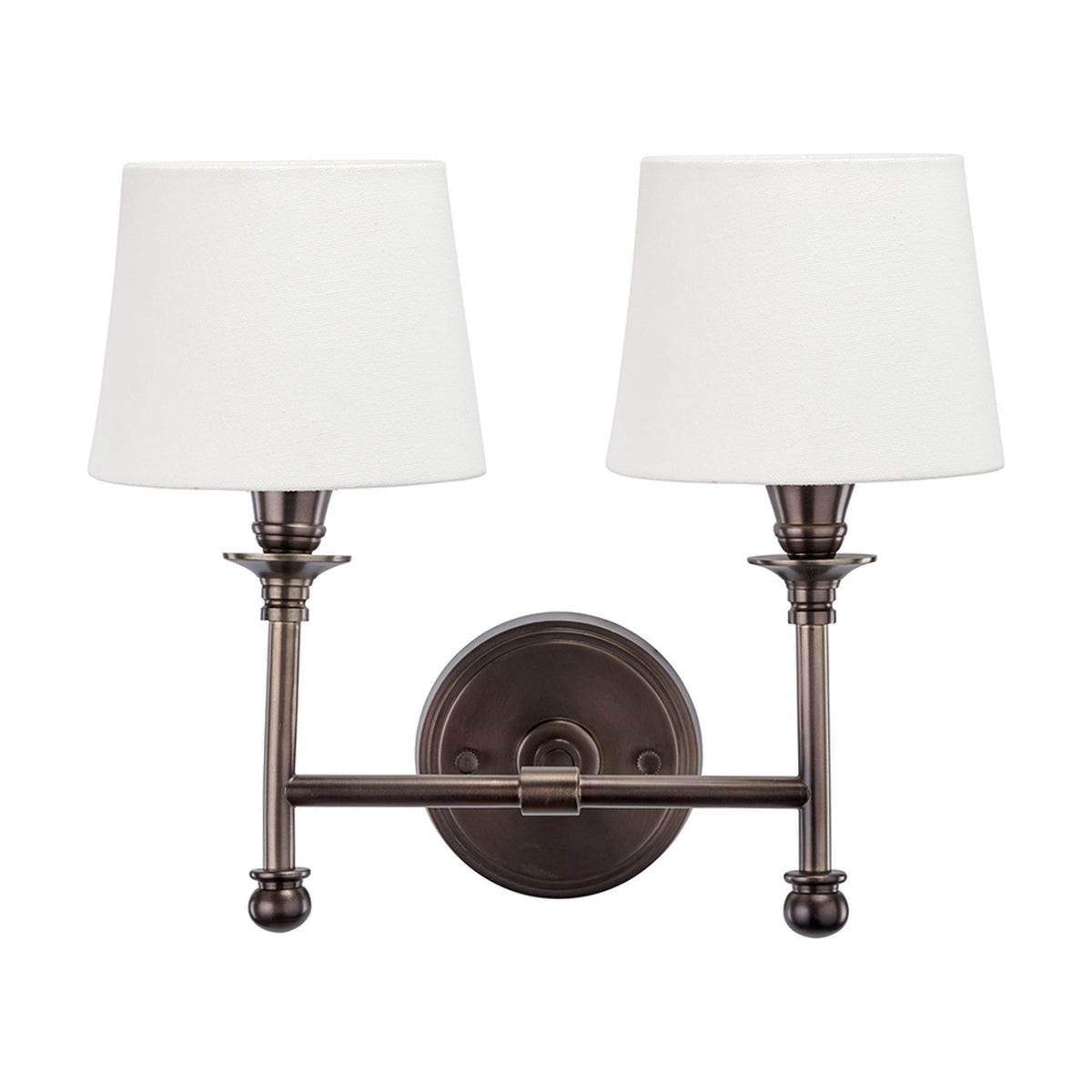 Piero Antique Bronze Double Wall Light with two white tapered fabric shades on a curved metal frame, shown against a plain white background.