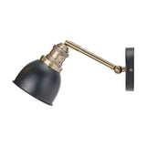 Augusto Black & Gold Task Wall Light with an adjustable brass arm, black dome shade and round wall mount, shown on a plain white background.