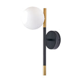 Wanda wall light with a white glass orb shade on a black and brushed gold metal stem, round black wall plate, shown on a plain white background.