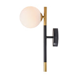Wanda wall light with a white glass orb shade on a black and brushed brass metal stem, mounted with a round black wall plate, shown on a plain white background.