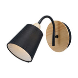 Juna Black Metal & Wood Wall Light with a round wooden backplate, adjustable black gooseneck arm, and black fabric cone shade, shown on a plain white background.