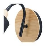 Close-up of the Juna wall light's round wooden backplate with black flexible gooseneck arm and cylindrical head, showing mounting screws on a plain background.
