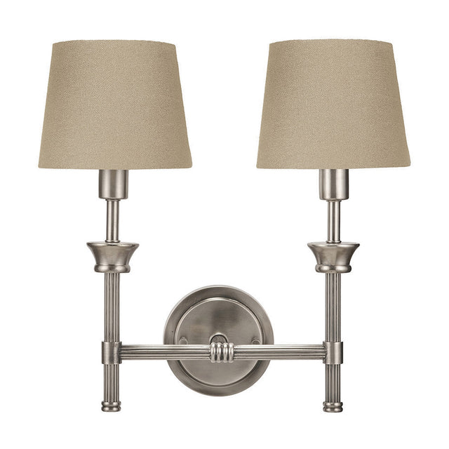 Salvatore double wall light in antique silver metal with reeded columns and two taupe fabric tapered shades, shown against a plain white background.