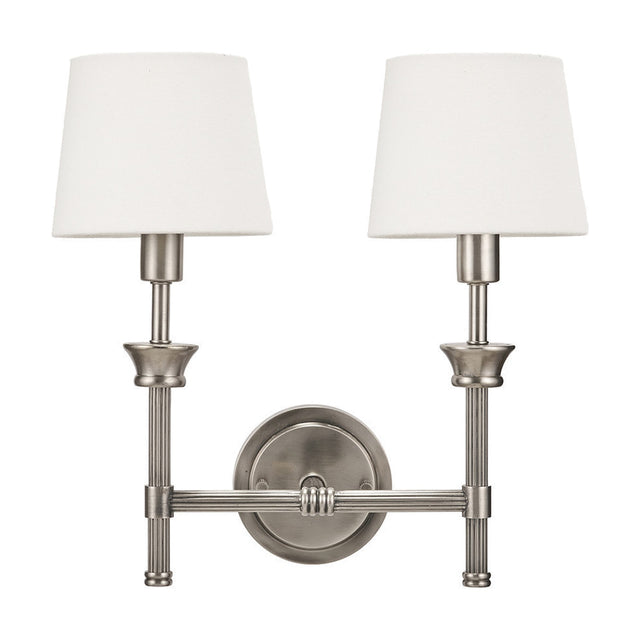 Salvatore double wall light in antique silver metal with reeded arms and two white fabric tapered shades, shown on a plain white background.