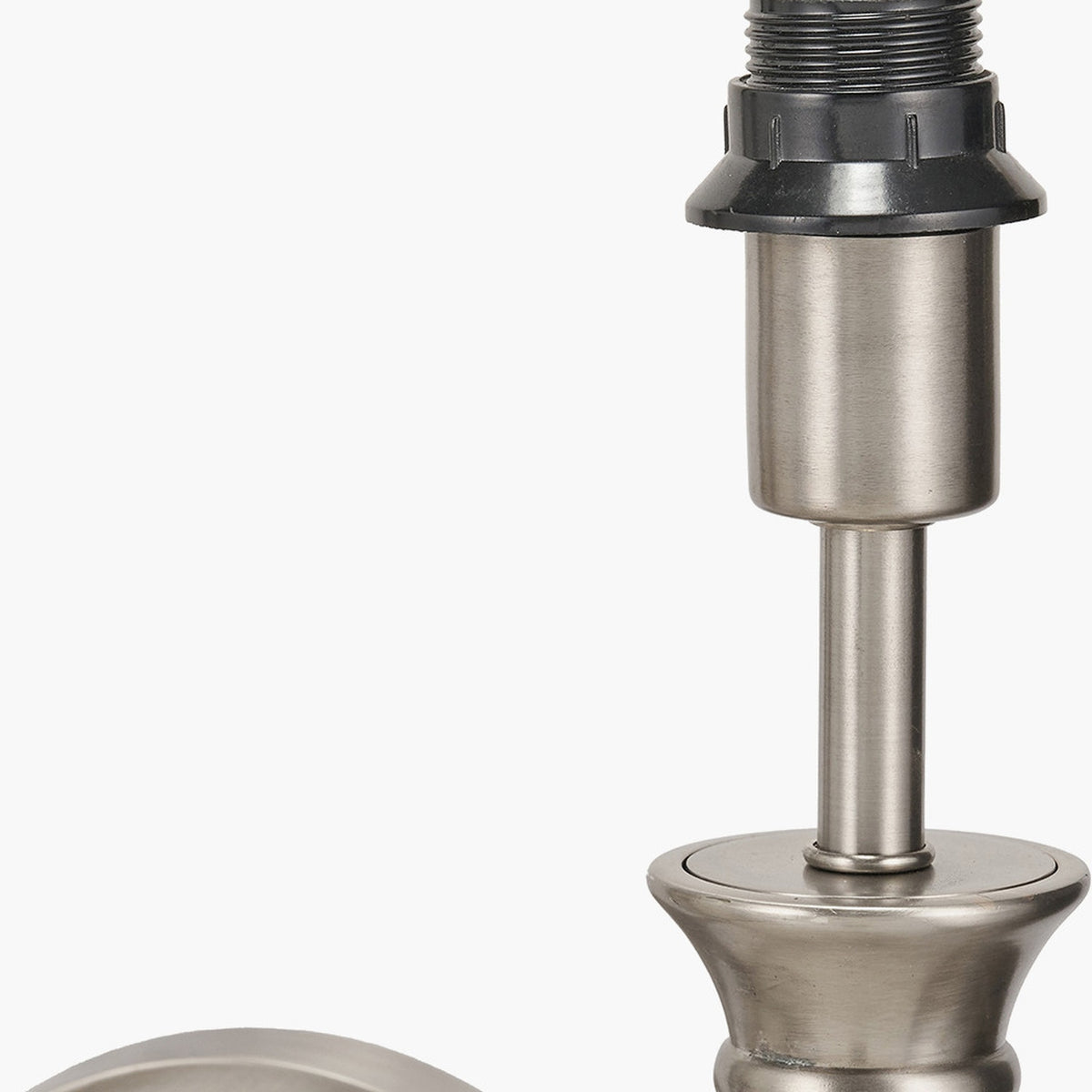Close-up of the Salvatore wall light's antique silver metal fitting, showing the threaded socket, black cap, and turned column detail against a plain white background.