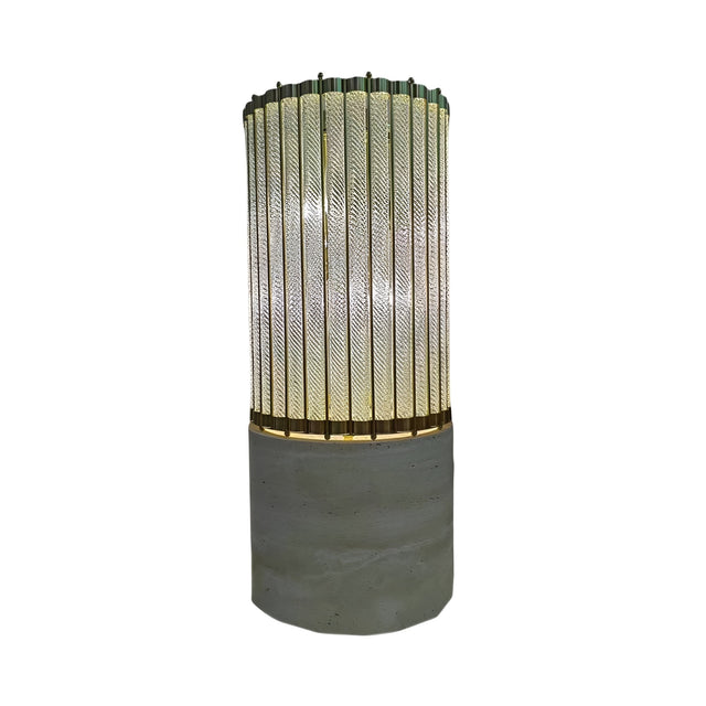 The Helixora 4 Light Twist Column Floor Lamp features a tall, twisted glass tube shade with textured diagonal lines and gold accents atop a cylindrical concrete base in brushed bronze, isolated on a white background.