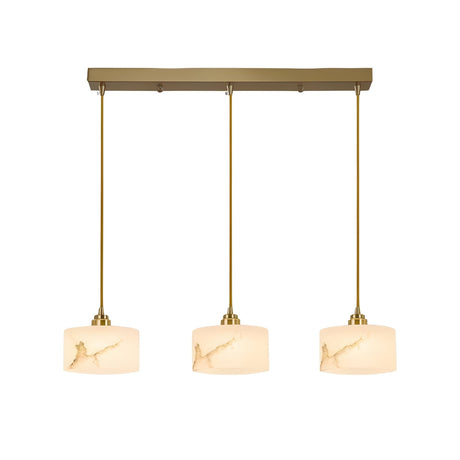 The Brinex 3 Light Linear Alabaster Bar Pendant Light features three soft white cylindrical shades and brushed brass accents, creating a modern look with its sleek bar design.