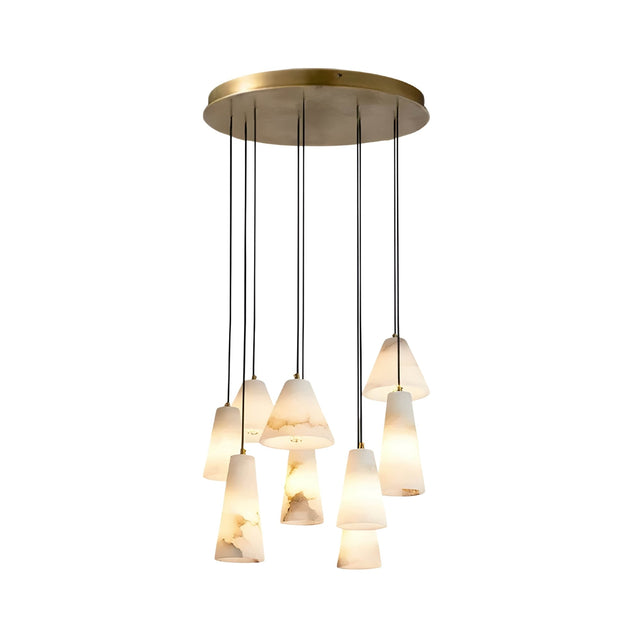 The Sorrelis 9 Light Cluster Alabaster Pendant Light features nine soft white cone-shaped lampshades suspended at different lengths from a round, brushed brass mount, providing a warm, diffused glow.