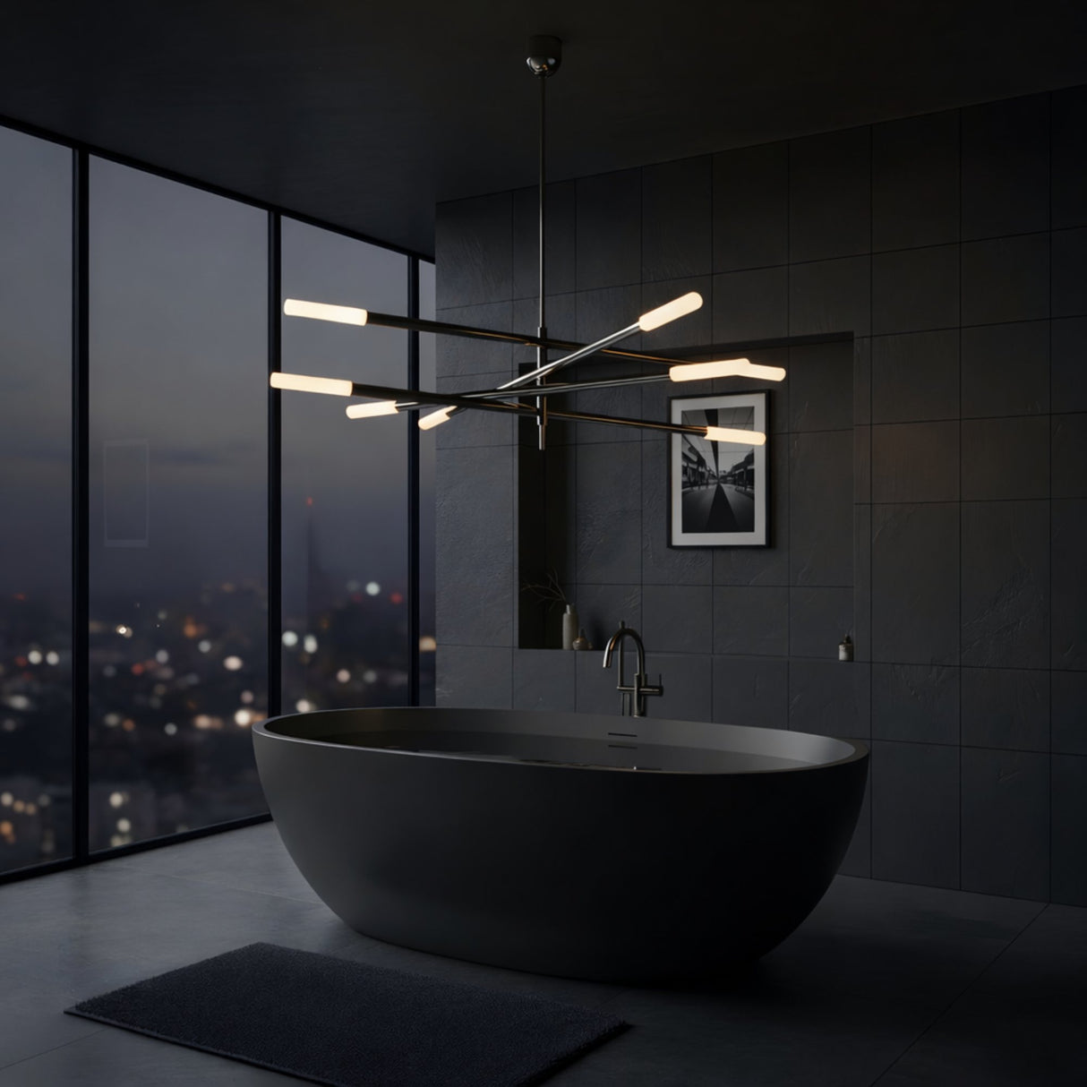 Modern bathroom with a large matte black bathtub, dark tile walls, and the Aurelian LED Layered Arms Alabaster Chandelier in Matte Black & Soft White. A big window frames a night city view, with a framed photo and dark rug adding minimalist touches.