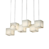The Elmyra 6 Light Linear Alabaster Bar Pendant Light in Soft White features six suspended, cube-shaped Spanish alabaster shades with natural marbling, offering soft, diffused illumination and a striking linear design.