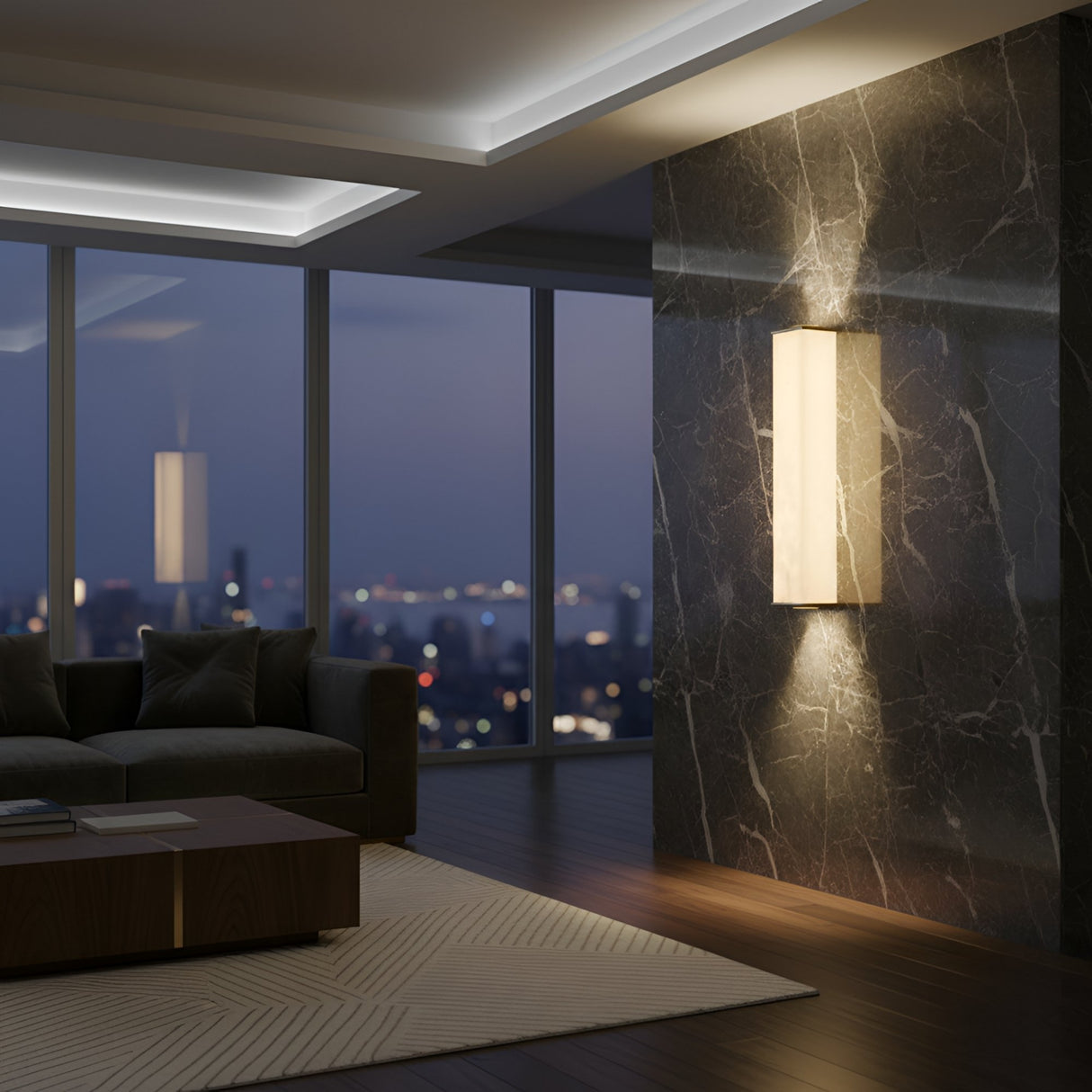 A modern living room with a city view at dusk, a dark marble accent wall featuring the Valmere LED Small Linear Alabaster Wall Light in soft white, a brown sofa, and a wooden coffee table on a light striped rug.