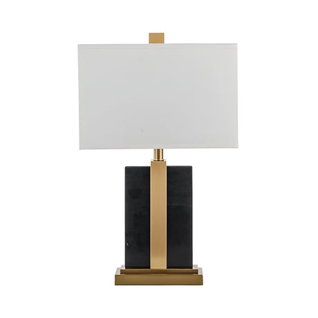 The Elvaris 1 Light Framed Marble Table Lamp features a modern design with a rectangular white shade, brass base and accent, and a black framed marble body.