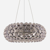 The Briller LED Large Suspension Light - Clear is a contemporary circular pendant fixture that integrates state-of-the-art LED technology and is designed with a sleek metallic frame embellished with multiple clear acrylic spheres. It hangs elegantly from slender wires, offering a stylish and sophisticated aesthetic.