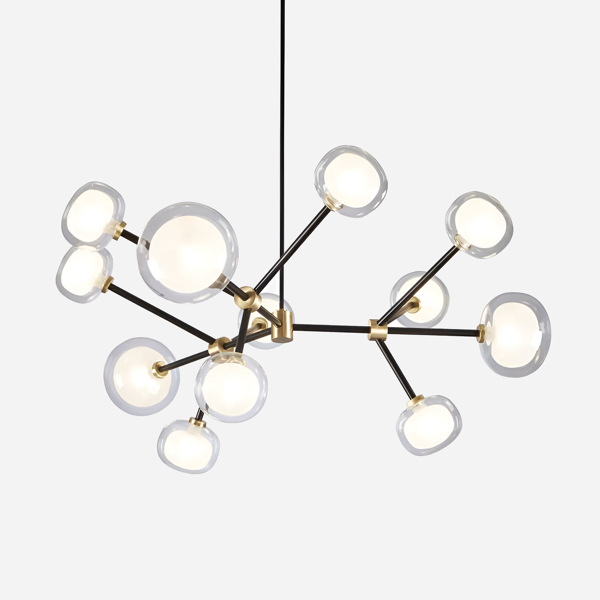 The Galaxy 12 Light Suspension - Black & White features a sleek black frame paired with ten spherical glass bulbs, providing a modern take on classic chandeliers. Its branching design introduces contemporary elegance against a plain white background, all while nodding to retro influences.