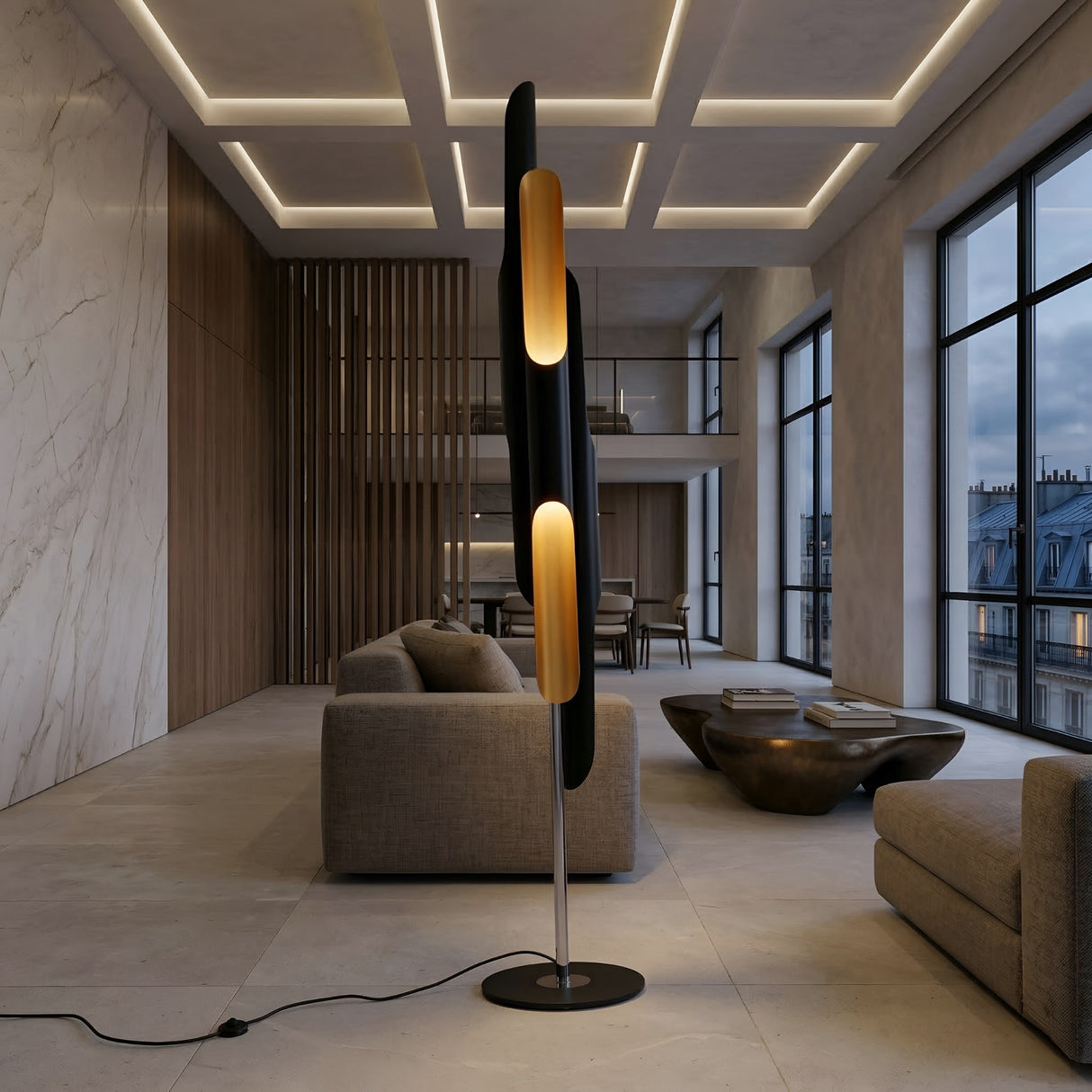 A modern living room with marble walls, large windows, neutral-toned sofas, and the Stealth 6 Light Floor Lamp in brass and black. A contemporary coffee table sits at the center of the space.