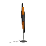 Niori Stealth 6 Light Floor Lamp with staggered matt black tubular shades, brushed brass interiors, chrome stem and round black base on a white background.