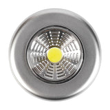 LYYT battery COB LED push light with circular brushed silver housing and central cool white 6000K LED, shown on a plain white background.