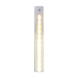 LYYT 36 LED motion sensing light bar by AVSL, illuminated in warm white with visible PIR sensor at the top, shown on a plain white background.