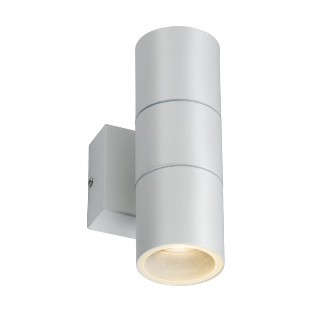 A contemporary cylindrical outdoor wall light fixture in white, featuring clean lines and a GU10 lamp base. Mounted on a square base and constructed from stainless steel, this light directs illumination downward, emphasizing its sleek and minimalist design.