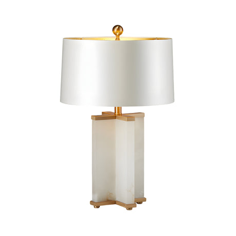 The Table 1 Light Column Alabaster Table Lamp in brushed brass and soft white features a rectangular alabaster base, gold accents, and a white drum shade topped with a gold finial for an elegant touch.