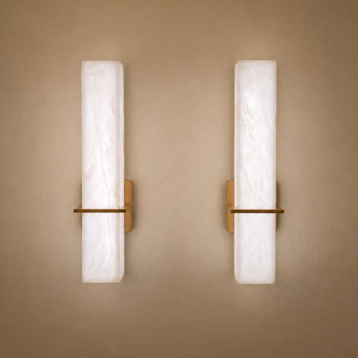 Aurevon LED Alabaster Vertical Panel Wall Light in brushed brass, shown as a pair with rectangular alabaster panels and horizontal brass arm brackets on a neutral background.
