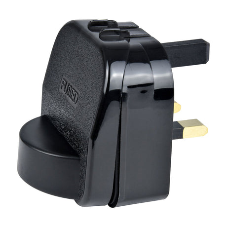 Mercury SCP euro to UK converter plug in black with UK 3-pin fittings, fused 13A label, and recessed 2-pin European socket, shown on a white background.