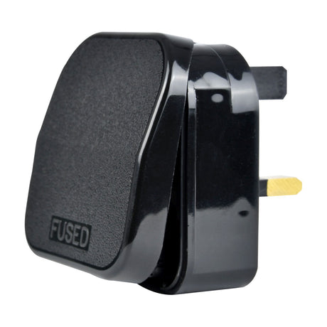 Mercury European converter plug in black with UK 3-pin output, 5A fuse carrier, and moulded FUSED label, shown against a plain white background.