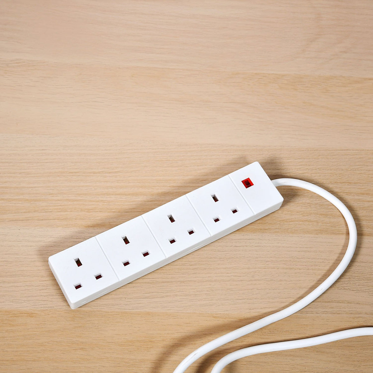 AVSL Mercury 4-gang white extension lead with four 13A UK sockets, red neon indicator and 3m cable, shown on a light wood surface.