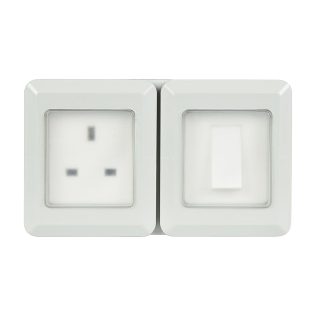 AVSL Mercury IP55 weatherproof unit in white with a 1-gang 13A switched socket and separate 10A switch behind clear covers, on a plain background.