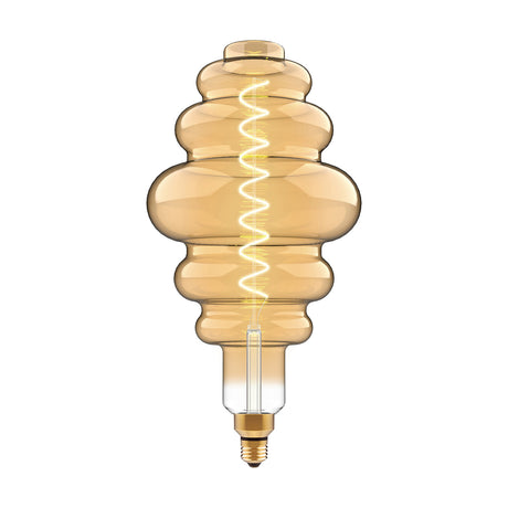 Vintage-style E27 LED filament bulb with tiered amber glass body, spiral warm-white filament, and brass-tone screw cap, shown on a plain white background.