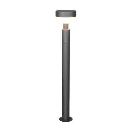Mackenzie 95cm LED outdoor lamp post in anthracite, tall slim aluminium column with a round head and opal diffuser emitting a warm white glow, shown on a plain white background.