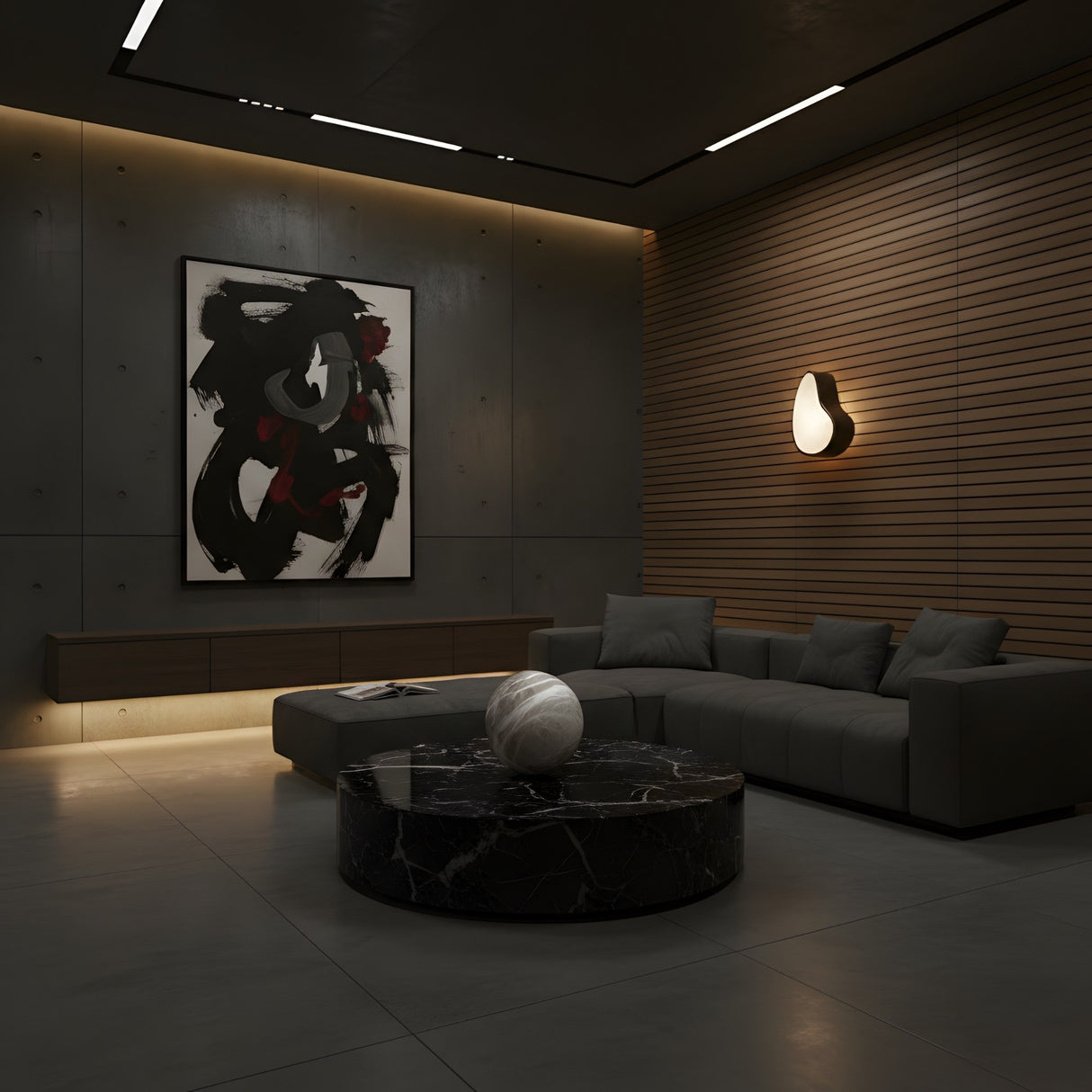 A modern living room with dark walls, a gray sectional, a black marble coffee table, abstract wall art, and soft indirect lighting from the Marea LED Alabaster Wall Light – Matte Black creates a cozy atmosphere.