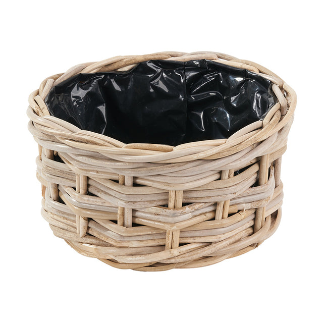 Round grey Kubu rattan basket planter with triple weave design and black plastic liner, shown on a plain white background.