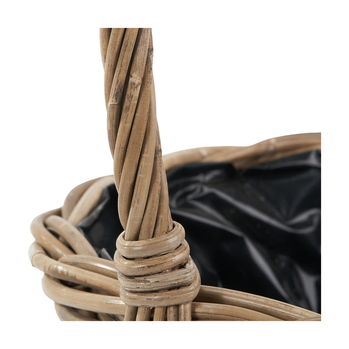 Close-up of the Tobs Kubu Rattan Flower Basket Planter showing twisted rattan handle, woven grey rattan body, and black inner lining, on a white background.