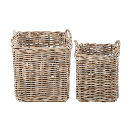 Tobs Set of 2 grey rattan log baskets, 59cm tall square woven storage baskets with looped handles, shown in different sizes on a plain white background.