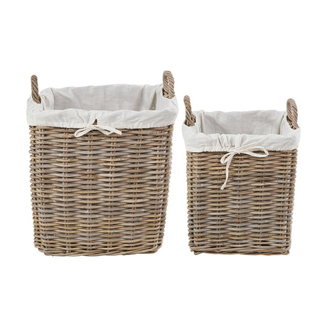Set of two grey Kubu rattan log baskets with white fabric liners and drawstring ties, featuring woven handles, shown on a plain white background.