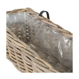 Close-up of the Tobs grey Kubu rattan wall hanging trough planter, showing woven rattan sides, a black hanging strap, and a clear plastic liner inside.