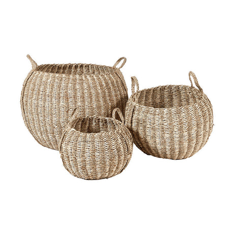 Set of 3 round seagrass and palm leaf storage baskets in natural woven stripe finish with looped handles, largest 56cm wide, shown on a plain white background.