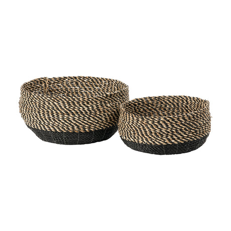 Set of 2 round seagrass storage baskets with natural woven upper bands and black woven bases, shown on a plain white background.