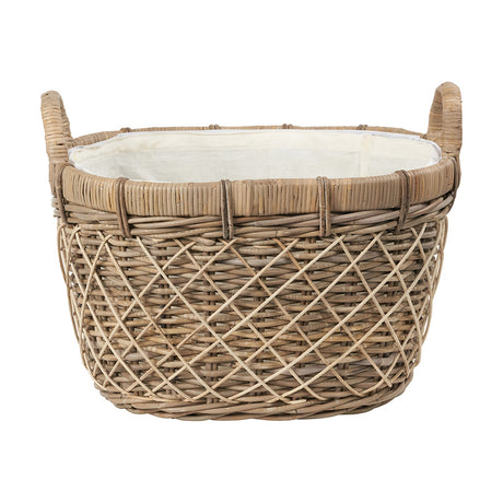 Brown rattan oval laundry basket, 44cm, with woven lattice sides, rolled rim, cotton liner, and two curved side handles, shown on a plain white background.