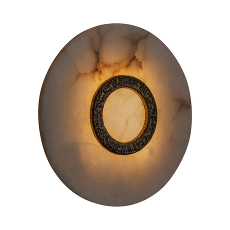 The Orvani LED Round Alabaster Wall Light in Soft White & Brushed Brass features glowing white marble with gray veining, a textured dark ring, and an integrated LED that softly backlights the elegant circular design.