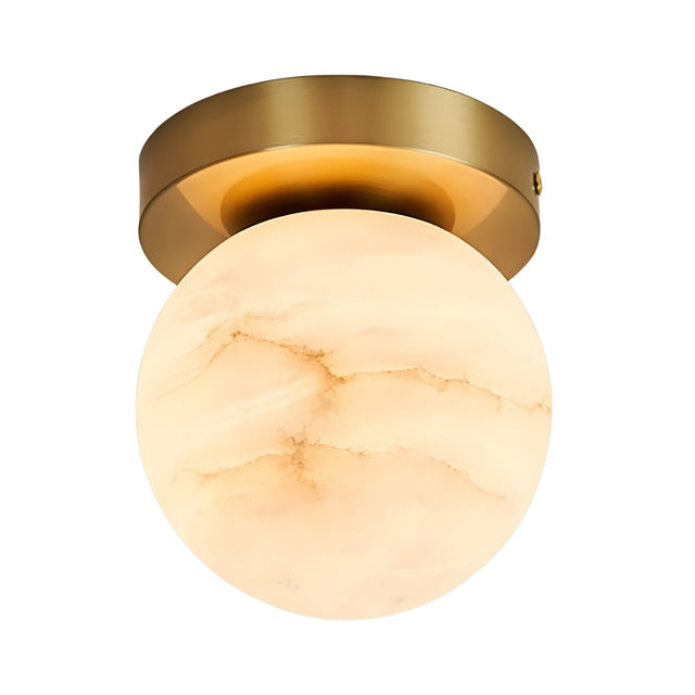 The Bravora 1 Light Globe Alabaster Semi-Flush Ceiling Light features a marble-patterned globe with a soft white glow, mounted on a brushed brass circular base, shown against a white background.