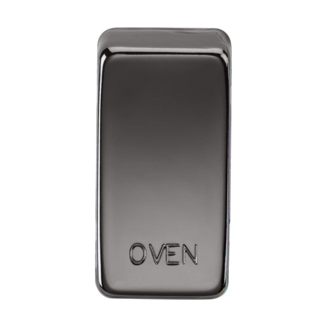 A close-up image of a glossy black nickel rectangular button with "OVEN" embossed on it. The surface reflects light, providing a sleek and modern appearance. These Switch Cover "Marked OVEN" - Black Nickel offer an interchangeable design for customizable control panels.