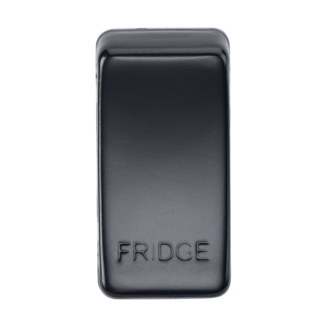 Introducing the Switch Cover "Marked FRIDGE" in matte black, a sleek and sophisticated accessory for any kitchen. Crafted with durable ABS construction, this rectangular cover features the word "FRIDGE" elegantly embossed on its surface, offering a smooth finish that enhances your kitchen's decor.