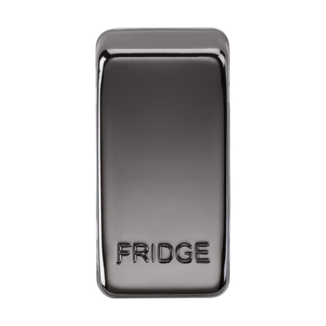 Introducing the Switch Cover "Marked FRIDGE" - Black Nickel: a sleek, metallic fridge magnet featuring a reflective surface and a black nickel finish. The word FRIDGE is stylishly embossed on the bottom half of its rectangular shape, complete with rounded edges. Crafted from durable ABS construction, this design ensures long-lasting appeal.